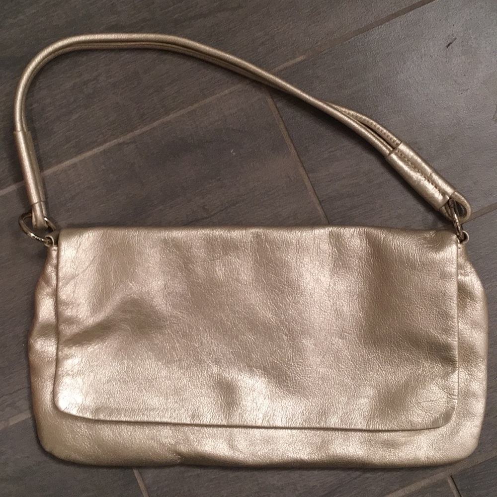 Banana Republic gold fold over flap purse